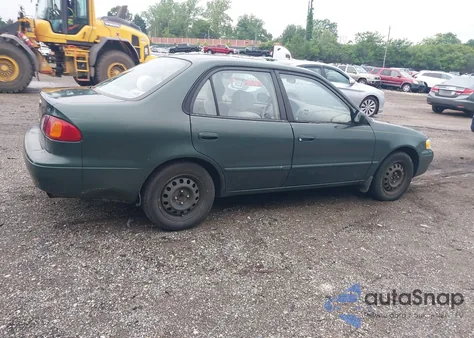 2000 Toyota Corolla Le from USA, damaged, VIN 2T1BR12E2YC309516